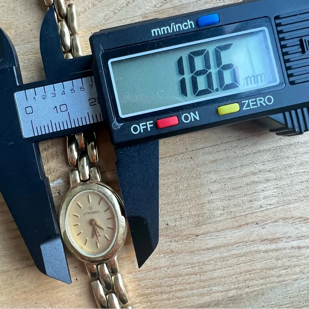 Montreux ladies oval gold tone dress Watch NEW BATTERY